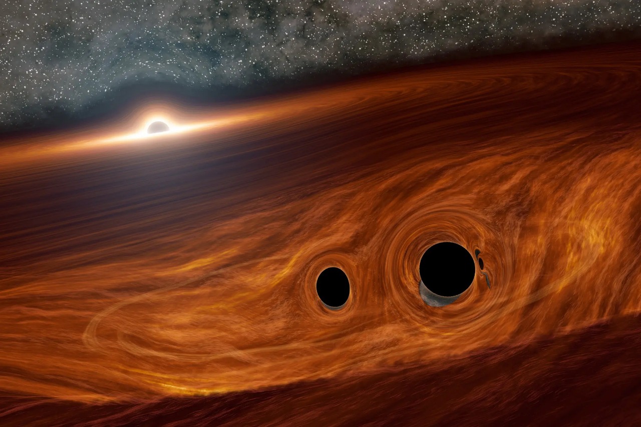 Astronomers Reveal First-Ever Image Of Orbiting Black Holes
