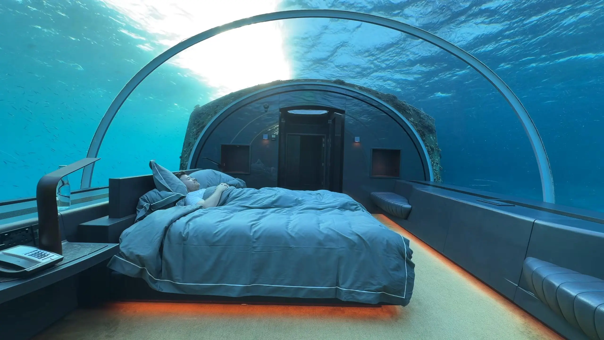 Tourist Pays $18,000 to Sleep Under the Ocean as Sharks Circle