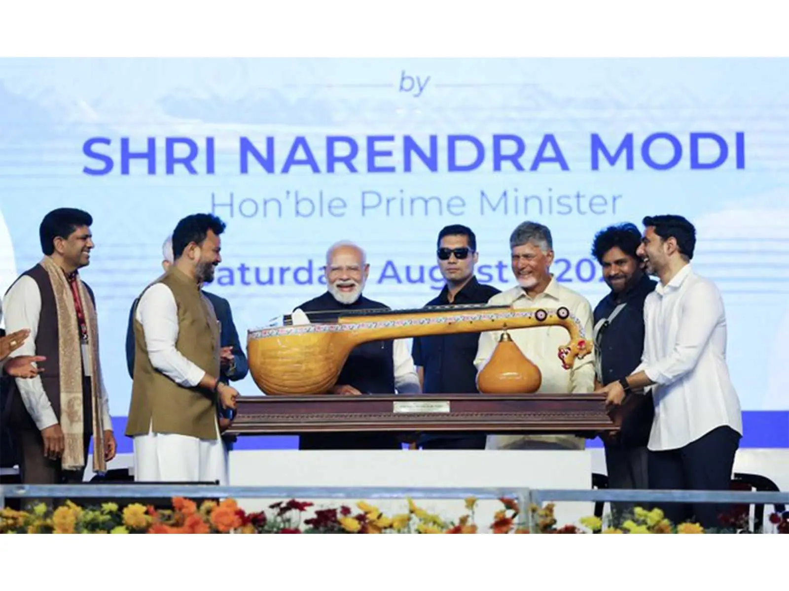 Striking a High Note in AP: PM Modi Gifted GI-Tagged Bobbili Veena at Airport Launch