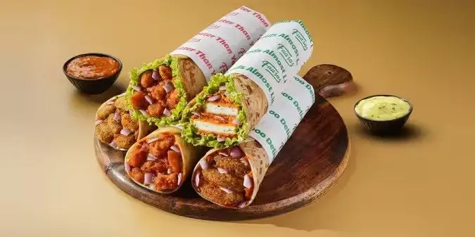 Why Did Zomato’s AI Suggest Mexican Wraps for a Traditional Kolkata Feast?