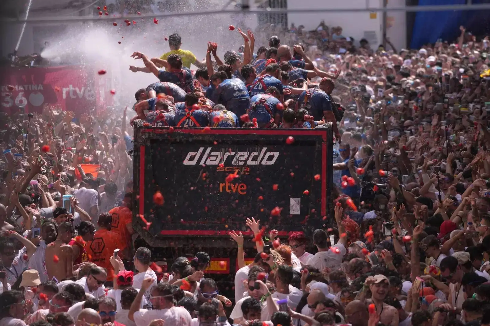 Saucy Spectacle: 20,000 Revellers Transform Buñol Into a Sea of Red