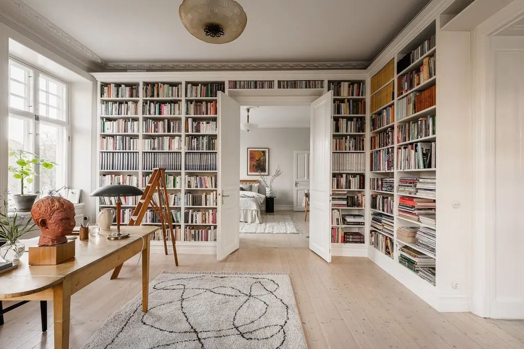 Can Wall-Less Shelves and Secret Doorways Redefine Modern Home Libraries?