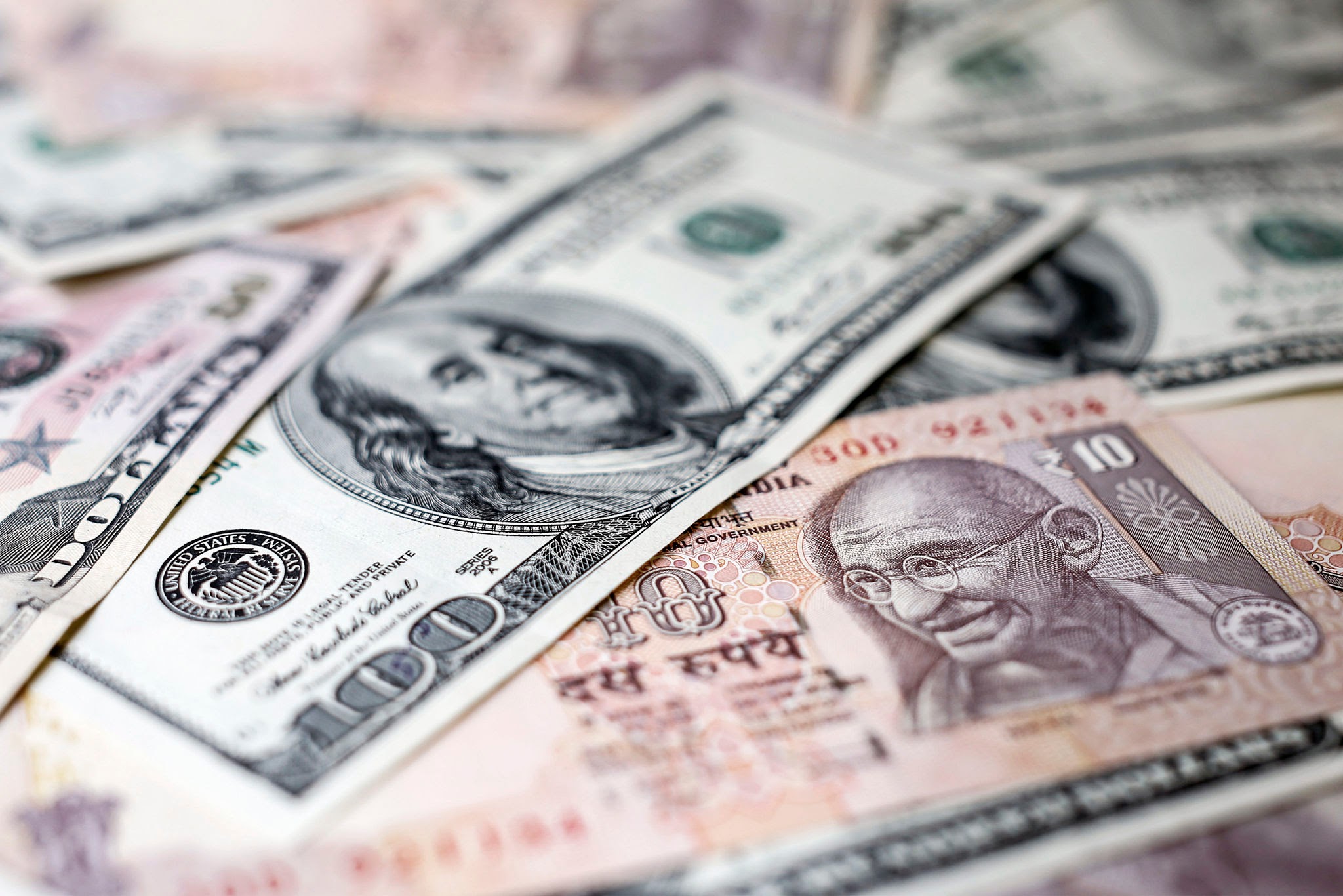 Indian Rupee Rises 0.3% to 95.64 as RBI Intervenes via Dollar Sales