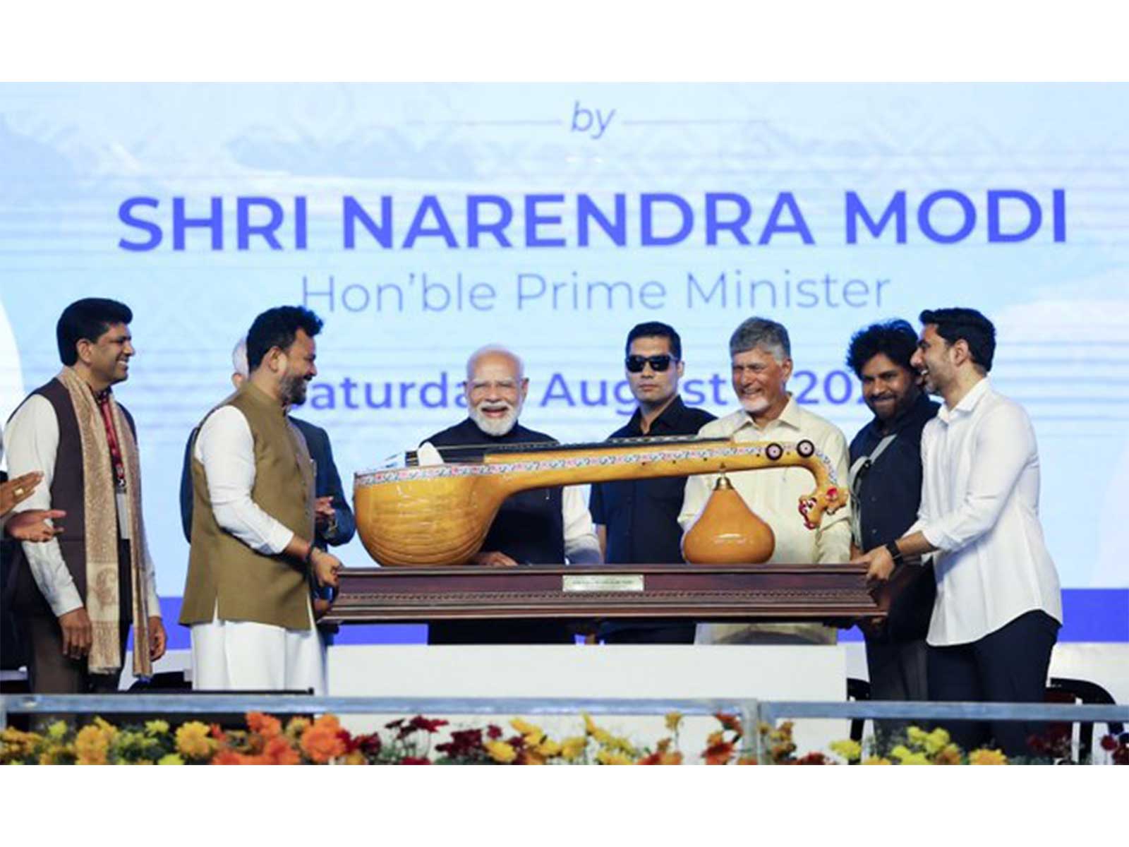 Striking a High Note in AP: PM Modi Gifted GI-Tagged Bobbili Veena at Airport Launch