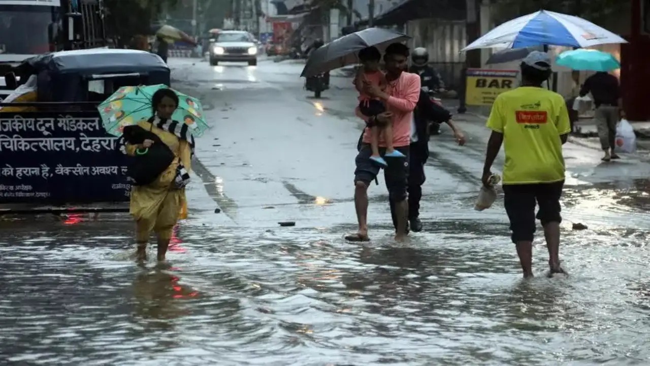 Umbrellas Up, Tempers Down: Rain Returns to the Heartland