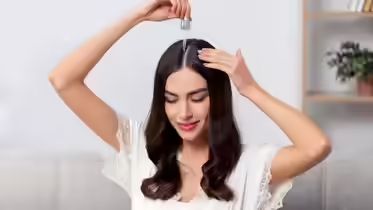 Morning vs night hair oiling: What timing works best for growth and scalp health
