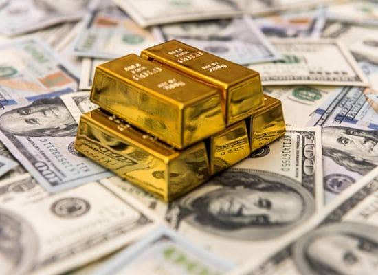 Gold Retreats as Markets Grapple with Tariff Turmoil and Courtroom Drama