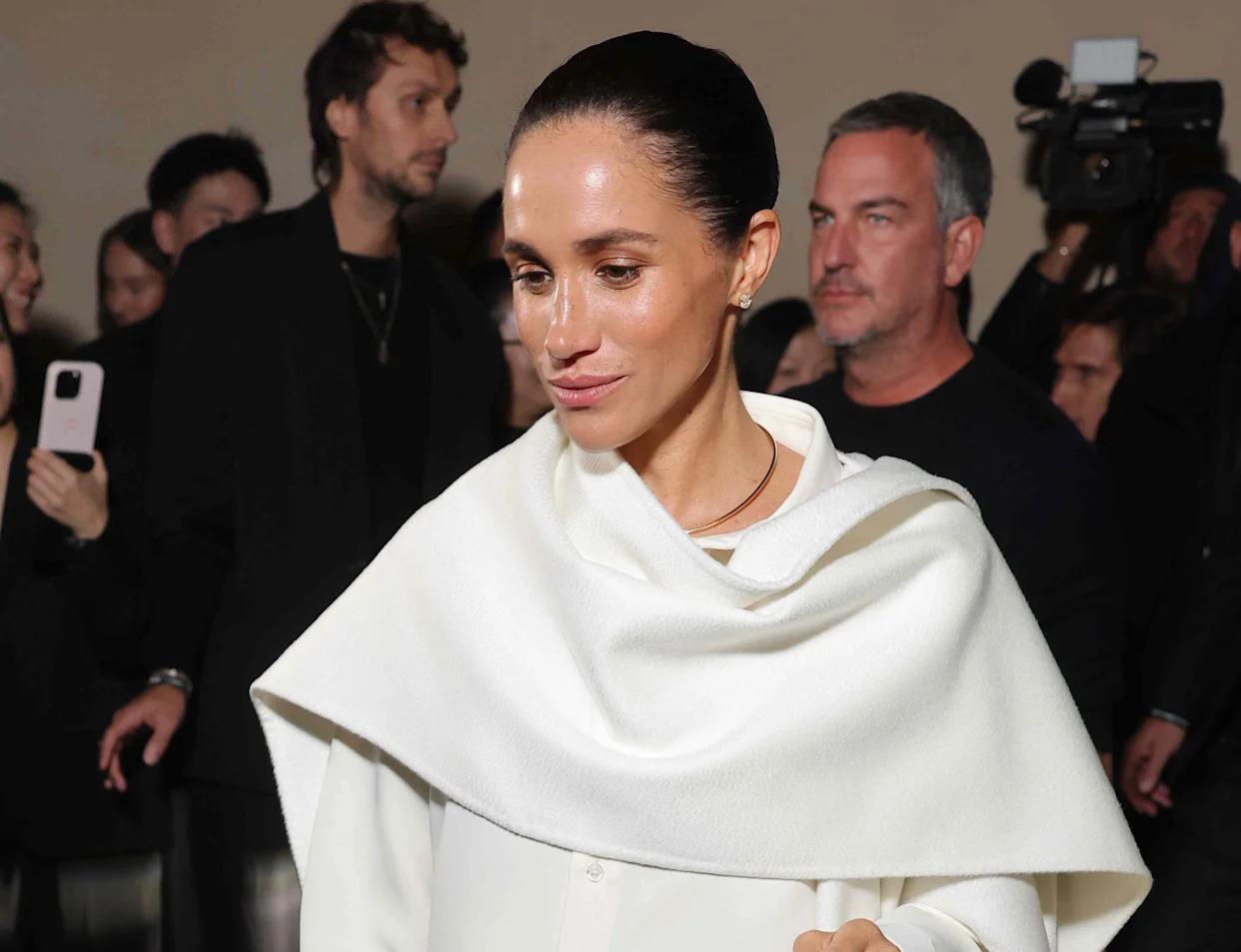 Royally Chic: Meghan Markle Makes A Stylish Comeback To Paris Fashion Scene