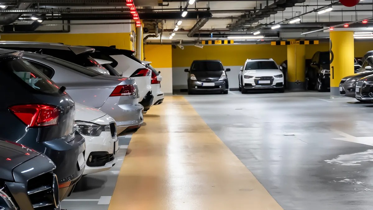 Buying a flat or financing a parking empire? How separate parking charges tilt the value equation